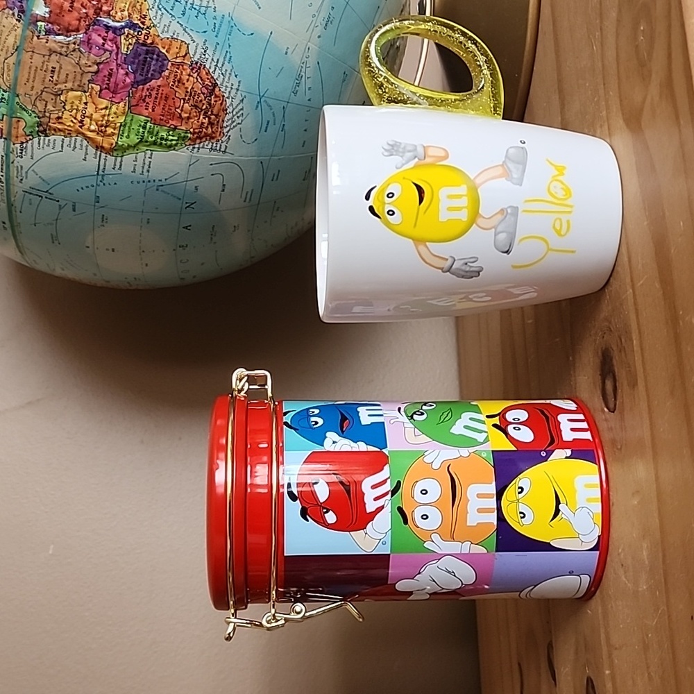 M&M Yellow ceramic coffee mug and tin